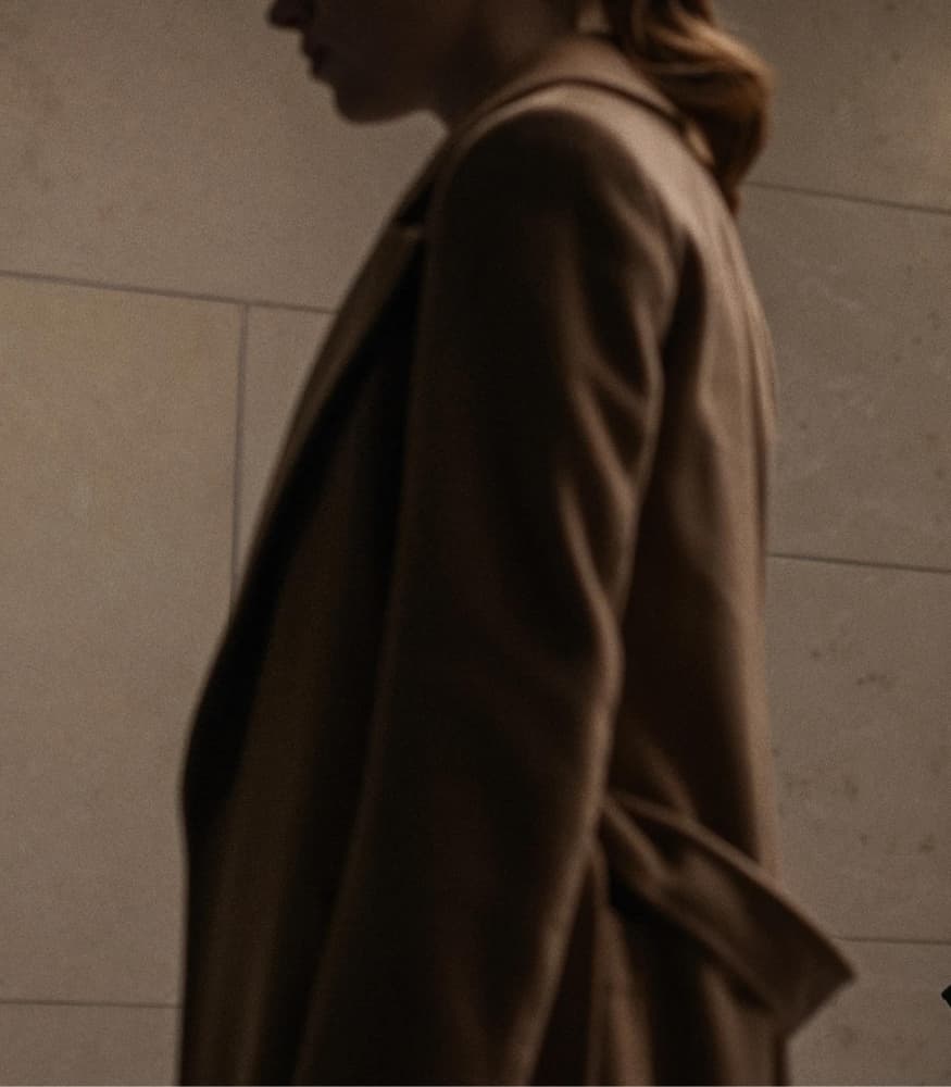 fair-play-phoebe-dynevor-brown-coat